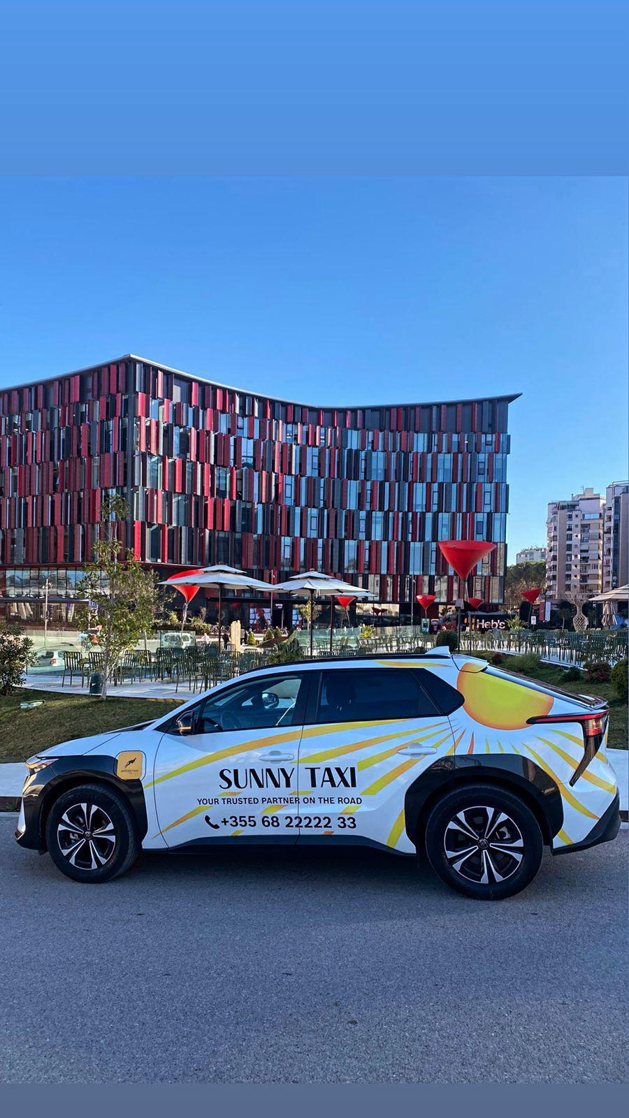 Happy taxi driver in sunny Albania
